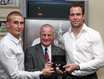 Sam Tompkins & Pat Richards receive the 2011 award from Alex Murphy